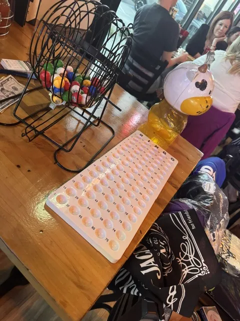 Bingo cage and board on a table